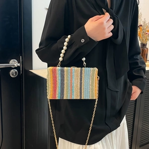 Colorful woven box bag with elegant pearl handle and gold chain strap for women