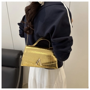 Gold crocodile pattern shoulder bag with metallic V-clasp and chain strap for women