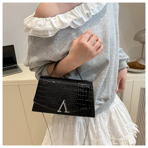 Fashionable black crocodile pattern shoulder bag with silver V-hardware and chain strap