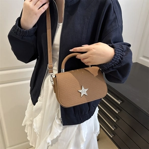 Brown woven star crossbody bag with silver crystal star and chain strap for women