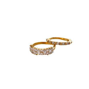 Elegant gold plated double rings with stacked zircon stones in a luxury minimalist style