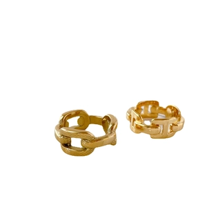 Minimalist gold chain style rings featuring textured mesh and polished hollow design