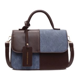 Retro patchwork handbag in dark brown faux leather and blue denim with top handle