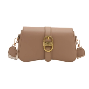 Brown vintage baguette bag with gold buckle and adjustable zigzag print shoulder strap