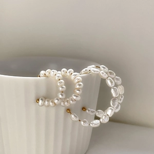 Elegant C-shaped handmade irregular freshwater pearl earrings on gold wire