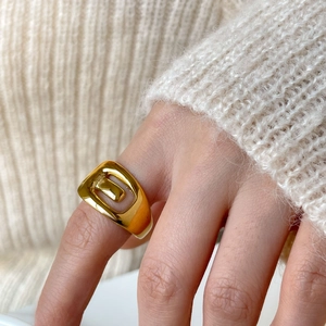 Irregular gold curved double-layer ring with hollow buckle design for women on finger