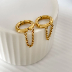 Close-up of 18K gold plated stainless steel hoop earrings with tassel chain detail