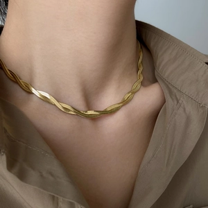 Chic gold-plated twisted snake bone necklace with a flat intertwined design for women