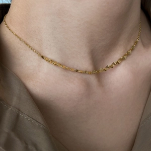 Minimalist layered gold snake chain necklace with fishbone link for chic street style