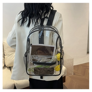 Detailed view of clear PVC backpack showing transparent texture and spacious interior storage