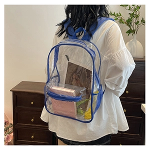 Detail of transparent PVC backpack with bright blue trim and adjustable canvas straps