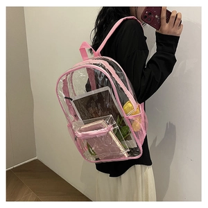 Detail view of transparent PVC backpack showing pink straps and spacious interior storage