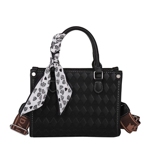 Black quilted tote bag with silk scarf and vintage monogrammed wide shoulder strap