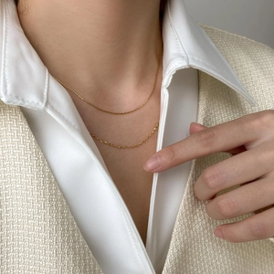 Minimalist double layer gold clavicle necklace for women with slim snake chain design