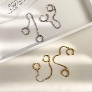 Minimalist double hoop earrings with cubic zirconia chains in gold and silver finish