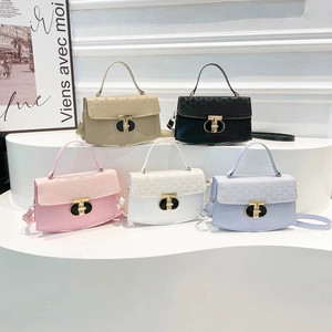 Fashionable monogram handbag set with metal lock closures in five stylish colors