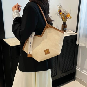 Retro canvas tote bag in cream white with brown leather trim and stylish woven strap