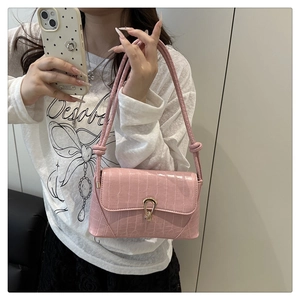 Pink crocodile pattern PU leather shoulder bag featuring a gold horseshoe metal clasp