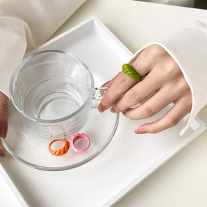 French vintage style bread pattern twist rings in green orange and purple colors