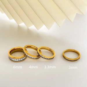Gold plated titanium steel rings showing 6mm 4mm 3.3mm and 3mm width options