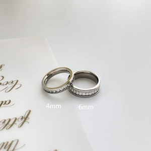 Detailed comparison of 4mm and 6mm full eternity bands with sparkling channel-set stones