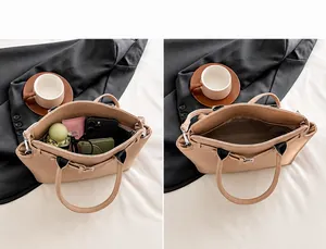 Detailweergave van het ruime hoofdvak van deze stijlvolle shopper met veel opbergruimte