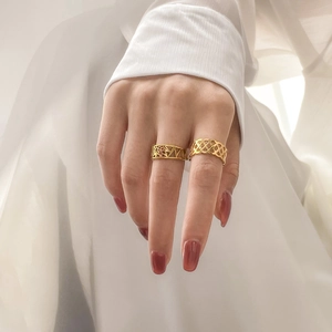 Minimalist gold geometric hollow mesh rings shown on hand for elegant styling