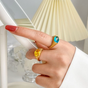 Vintage 18K gold plated titanium rings with large oval blue and yellow zircon gemstones