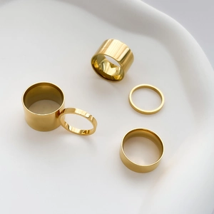 Five-piece set of minimalist gold chunky and thin polished stainless steel stackable rings