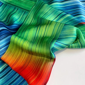 Detailed macro view of colorful gradient silk scarf with smooth satin texture finish