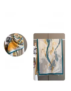 Detail of artistic abstract landscape scarf featuring soft tassels and multi-color knit