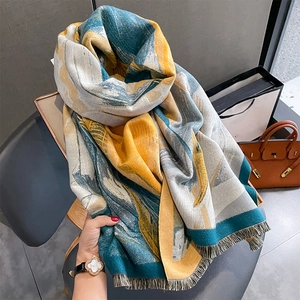 Thick faux cashmere scarf for women with blue and yellow abstract print and gray tassels
