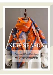 Detail of orange and blue cashmere shawl with geometric patterns and fringe edges