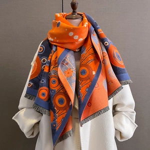 Thick warm cashmere-like shawl scarf with orange navy geometric dots and tassels