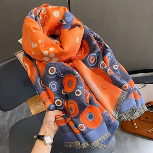 Thick orange and navy cashmere-style scarf with artistic dots and fringe tassels