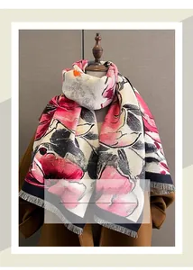 Detail of floral print cashmere-feel scarf with soft tassels and warm thick fabric
