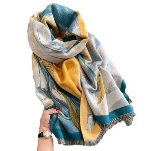Thick faux cashmere scarf for women with blue and yellow abstract print and fringes