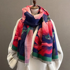 Thick cashmere-feel scarf with vibrant floral print and tassels for winter warmth