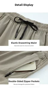 Pantaloni sportivi kaki con vita elastica a coulisse e tasche con zip sicure
