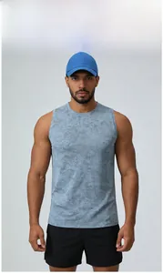 Front view of grey printed athletic tank top on model for gym and running workouts