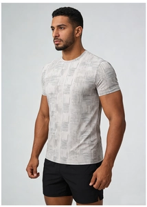 Detail of light grey athletic t-shirt with geometric patterns for men's fitness and running