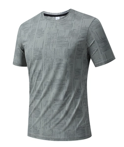 Detail of grey men's quick-dry sports t-shirt with breathable mesh and abstract pattern