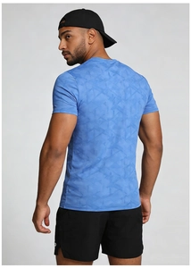 Detail view of the breathable fabric and geometric print on the blue sports t-shirt