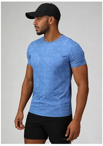 Close-up of blue quick-dry men's t-shirt showing detailed geometric patterns