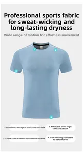 Detail of light blue quick-dry sports tee showing reflective logo and reinforced hemline