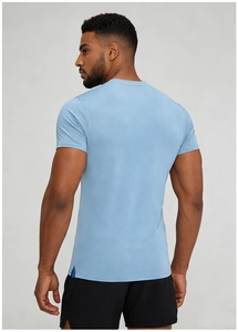 Detail view of light blue athletic t-shirt featuring breathable fabric and side slit hem