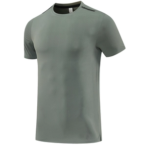 Detail of grey-green quick-dry sports shirt with crew neck and raglan sleeve design