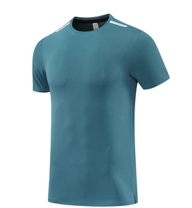 Detail of teal fitness shirt showing breathable mesh fabric, crew neck and side slit