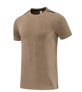 Detail of brown quick-dry sport tee with breathable fabric, black shoulder stripes and side slits