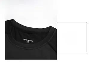 Detail of round neckline on men's black compression shirt with fine knit texture and size tag